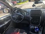 Dodge Caravan 2011 года за 2 000 000 тг. в Астана
