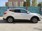 Hyundai Santa Fe 2015 года за 6 000 000 тг. в Актобе – фото 3