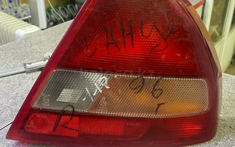 Задний фонарь в крыло Mitsubishi Lancer 1996 Г.в. Б.у Оригинал за 10 000 тг. в Караганда