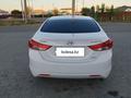 Hyundai Elantra 2013 годаfor6 300 000 тг. в Атырау – фото 2