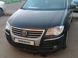 Volkswagen Touran 2009 года за 3 700 000 тг. в Астана – фото 4