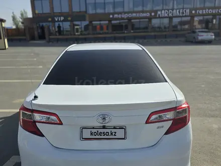 Toyota Camry 2013 года за 6 300 000 тг. в Кульсары – фото 2