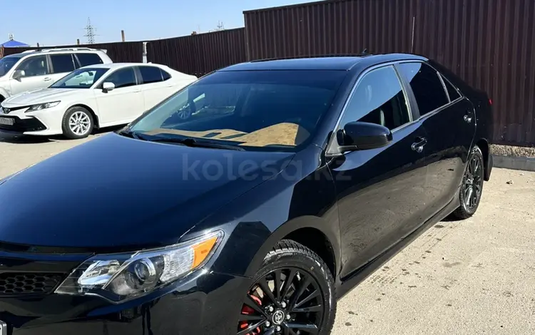 Toyota Camry 2014 года за 9 500 000 тг. в Атырау