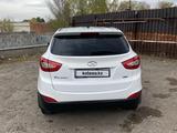 Hyundai Tucson 2014 годаүшін6 550 000 тг. в Караганда – фото 4