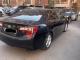 Toyota Camry 2014 года за 8 800 000 тг. в Астана – фото 2