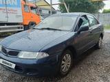 Mitsubishi Carisma 1998 года за 980 000 тг. в Алматы – фото 3