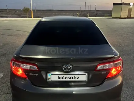 Toyota Camry 2013 года за 8 500 000 тг. в Жанаозен – фото 4