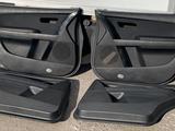 Обшивка двери дверные карты Mazda Cx9 TB за 45 000 тг. в Караганда