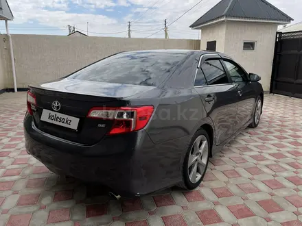 Toyota Camry 2012 года за 8 500 000 тг. в Жанаозен – фото 3