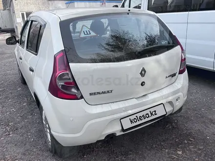 Renault Sandero 2012 года за 3 500 000 тг. в Караганда – фото 3