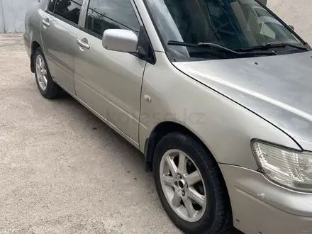 Mitsubishi Lancer 2001 года за 1 300 000 тг. в Алматы – фото 2