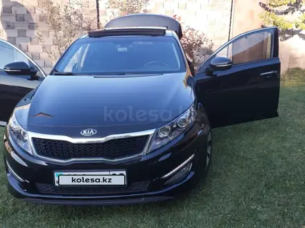 Kia K5 2013 года за 9 280 000 тг. в Алматы – фото 35