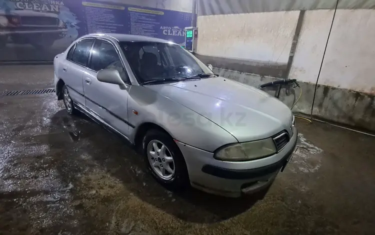 Mitsubishi Carisma 1996 годаүшін900 000 тг. в Астана