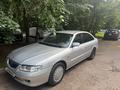 Mazda 626 1999 года за 2 100 000 тг. в Алматы – фото 2