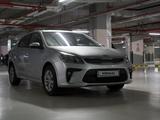 Kia Rio 2018 года за 6 590 000 тг. в Астана