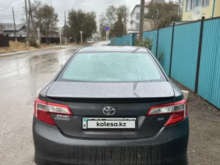 Toyota Camry 2014 года за 6 800 000 тг. в Актобе – фото 4