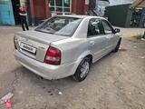 Mazda 323 2001 года за 1 000 000 тг. в Алматы – фото 2
