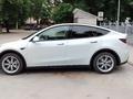 Tesla Model Y 2021 года за 16 500 000 тг. в Алматы – фото 2