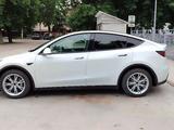 Tesla Model Y 2021 года за 16 500 000 тг. в Алматы – фото 2
