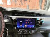 Установка Автомагнитолы и камеры заднего вида в Астана