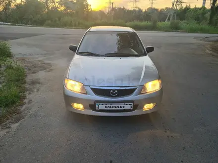 Mazda 323 2002 года за 1 800 000 тг. в Алматы – фото 5