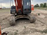 Аренда гусеничного экскаватора Hitachi ZAXIS 240-5G обьем ковша 1.3³ в Актобе – фото 2
