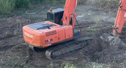 Аренда гусеничного экскаватора Hitachi ZAXIS 240-5G обьем ковша 1.3³ в Актобе – фото 4
