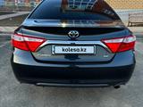 Toyota Camry 2015 года за 10 600 000 тг. в Уральск – фото 4