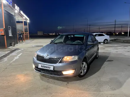 Skoda Rapid 2013 года за 4 400 000 тг. в Атырау – фото 3