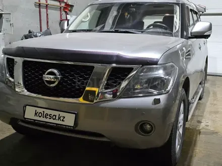 Nissan Patrol 2012 года за 13 500 000 тг. в Астана – фото 2