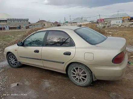 Mazda 323 1995 года за 1 300 000 тг. в Тараз – фото 4