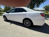 Toyota Camry 2015 года за 12 500 000 тг. в Актобе – фото 4