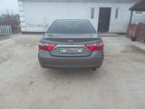 Toyota Camry 2014 года за 9 000 000 тг. в Атырау – фото 3