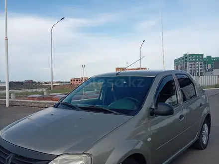 Renault Logan 2015 года за 2 600 000 тг. в Астана – фото 2