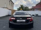 Toyota Camry 2014 годаүшін4 800 000 тг. в Жанаозен – фото 4