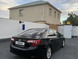 Toyota Camry 2014 годаүшін4 800 000 тг. в Жанаозен – фото 5