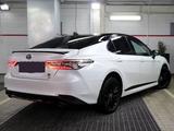 Toyota Camry 2023 года за 21 200 000 тг. в Жанаозен