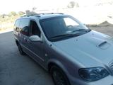 Kia Carnival 2002 года за 2 500 000 тг. в Абай (Келесский р-н) – фото 4