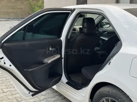Toyota Camry 2013 года за 5 200 000 тг. в Атырау – фото 15