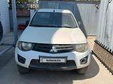 Mitsubishi L200 2010 года за 2 852 000 тг. в Атырау