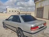 Mazda 626 1992 года за 950 000 тг. в Жанаозен – фото 4