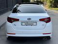 Kia K5 2012 года за 7 800 000 тг. в Алматы – фото 20