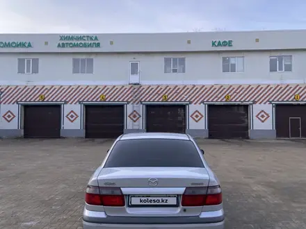 Mazda 626 1998 года за 2 100 000 тг. в Актобе – фото 3