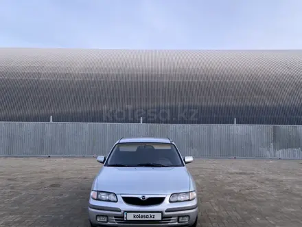 Mazda 626 1998 года за 2 100 000 тг. в Актобе – фото 6