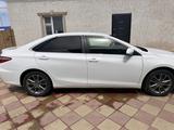 Toyota Camry 2014 года за 5 700 000 тг. в Кульсары – фото 2