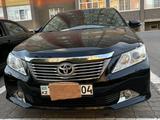 Toyota Camry 2014 годаүшін8 700 000 тг. в Актобе