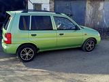 Mazda Demio 2002 года за 2 600 000 тг. в Актобе – фото 4