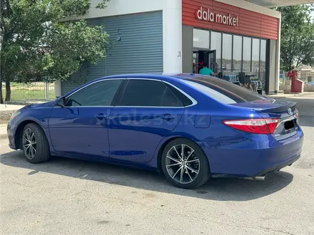 Toyota Camry 2015 года за 6 200 000 тг. в Атырау – фото 13