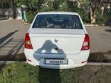 Renault Logan 2013 года за 2 700 000 тг. в Актобе – фото 3
