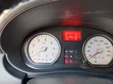 Renault Logan 2013 года за 2 700 000 тг. в Актобе – фото 4